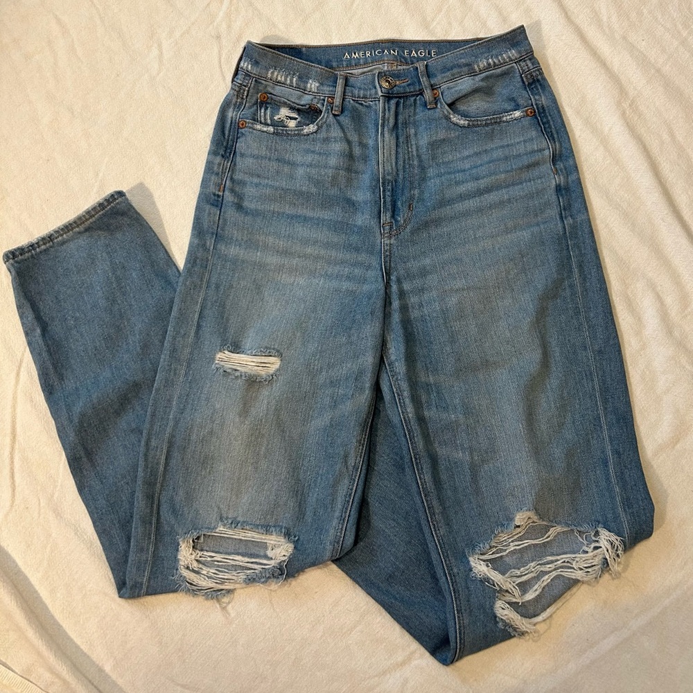American eagle straight jeans with rips and frayed ends